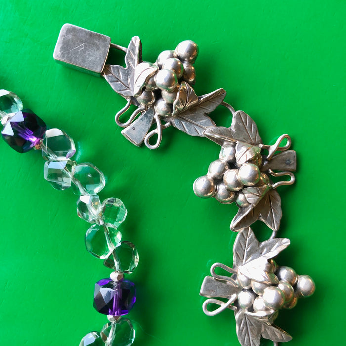 A close-up, detailed shot of the original box clasp of the vintage sterling silver bracelet of this set. The tiny hairline scratches noted in the description are visible. 